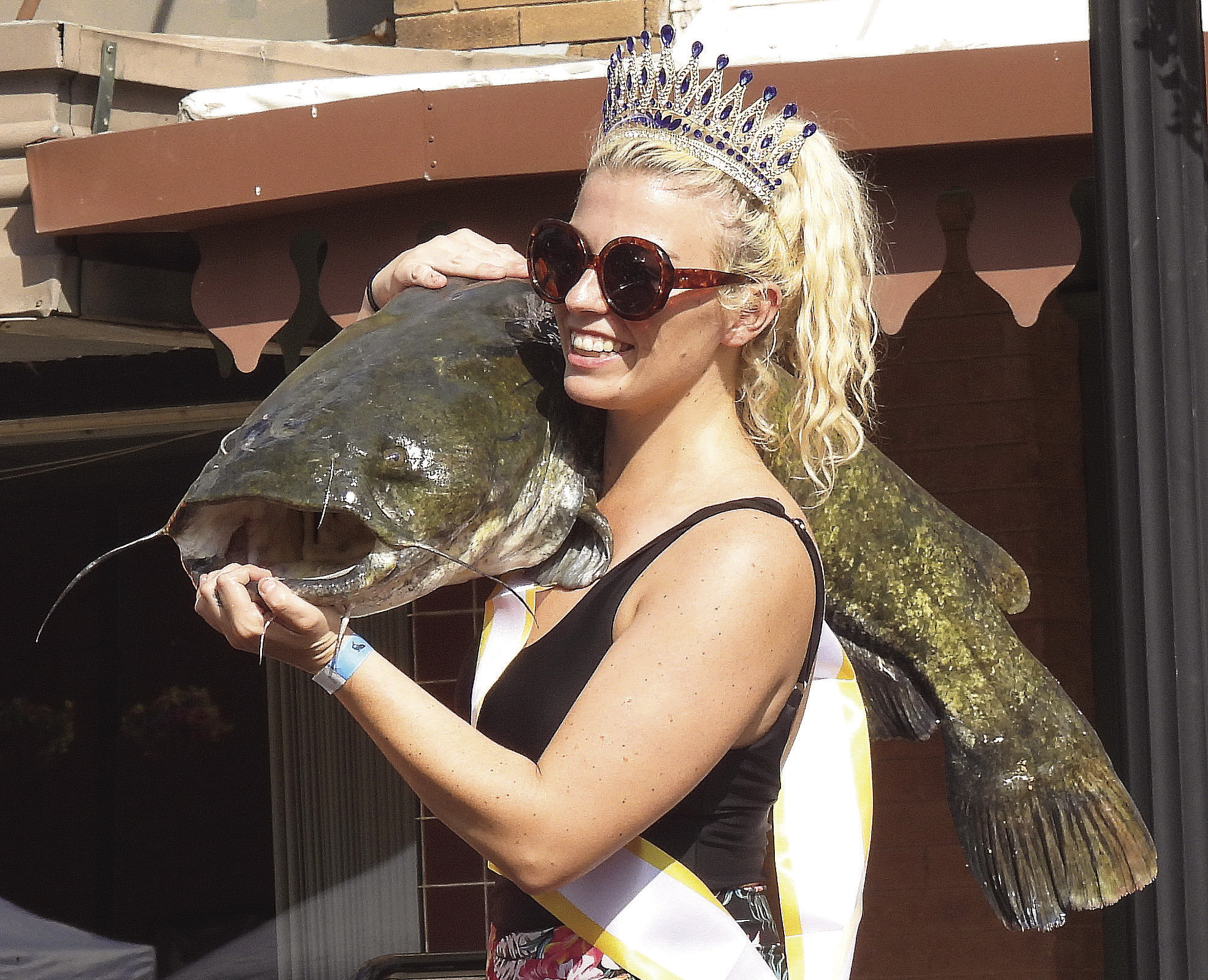 The 2026 Okie Noodling Queen, Shiane Mann, poses for pictures after being crowned at Saturday’s tournament. News Star photo by Chris Mackey
