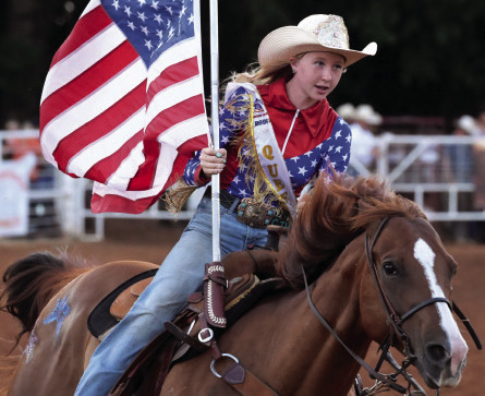 Charlie Herbert, the 2025-2026 Wynnewood Round-Up Club Rodeo Queen, takes a spin around the arena during Saturday night’s rodeo. Courtesy photo by Don Coffey