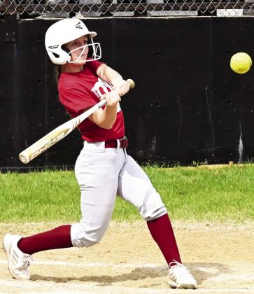 Wynnewood Junior High’s Ryann Nabors concentrates on the pitch during the RWB Tournament in Konawa Monday. News Star photo by Don Coffey