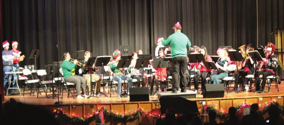 The Lindsay community was entertained by the beginning, advanced and high school bands at the high school auditorium on Tuesday evening, December 14. Mr. Watson, assistant band director, is pictured here directing the advanced band. Photo courtesy of Sheryl Kochert