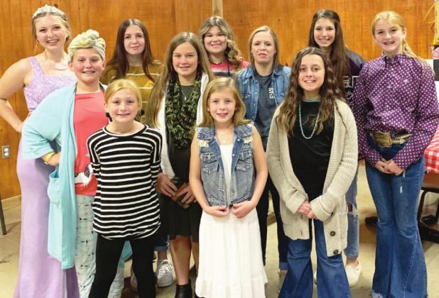 Garvin County 4-H members who recently competed in the Impressive Dress contest include, front row left to right, Tinley Milligan, Pauls Valley; Charlee Cothren, Stratford; and Bristol Meyer, Stratford. Back, left to right, are Karlie Koesler, Pauls Valley; Kolbi Koesler, Pauls Valley; Lauren Earp, Elmore City; Ella Lister, Stratford; Daisy Meadows, Elmore City; Ryan Burch, Elmore City; Taryn McCaa, Elmore City; and Kally Milligan, Pauls Valley. 