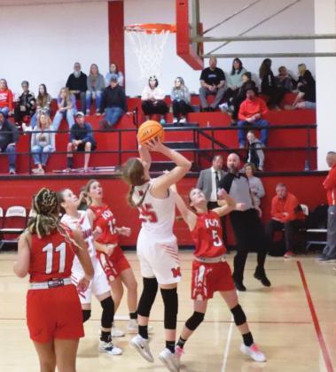Maysville's Kelsey House stops for the open jump shot during Monday night’s 49-34 win against Fox. Photo by Chris Mackey