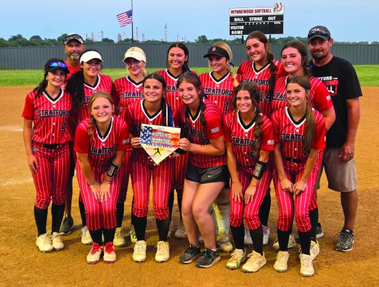 The Stratford Lady Bulldogs pose with their hard-earned Championship Trophy at Wynnewood’s RWB Tournament last weekend. News Star photo by Jennifer Lindsey