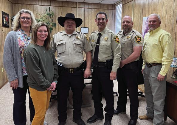 Maysville Schools welcomed a new school resource officer, Deputy Greg Lindsey, to the district last week thanks to a partnership with the Garvin County Sheriff's Office and funding from a Stronger Connections Grant through the Oklahoma State Department of Education. Pictured left to right are Maysville Superintendent Shelly Beach, Secondary Principal Krysti Kesler, Deputy Greg Lindsey, Sheriff Jim Mullett, Undersheriff James Richardson and Elementary Principal John Edwards. News Star photo by Suzanne Mackey
