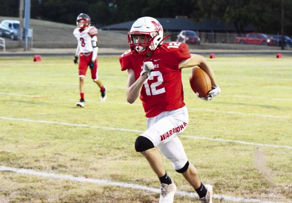 Maysville's James McGregor shows his speed as he outruns the Fox defender in Maysville's 52-6 win Friday night. Photo courtesy of Denny Park