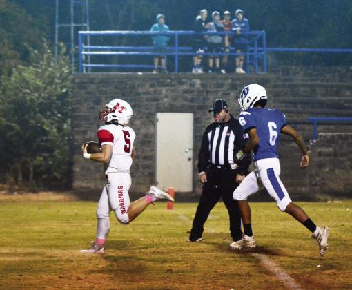 Maysville’s Nigel Reid runs for one of the two touchdowns he scored for the Warriors against Bowlegs last week. Photo courtesy of Denny Park