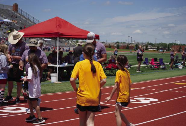 REC employees Jacob Trammell, Brandon McCaskill, and Justin Jones volunteered at the 2023 Special Olympics Oklahoma State Games along with the other 147 co-op volunteers across the state. Courtesy photo.
