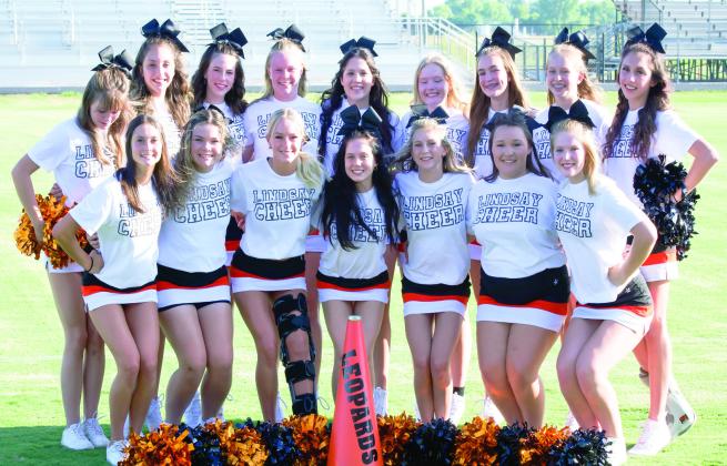 The Lindsay cheer squad took time out to pose for a group photo during Friday night's Meet the Leopards event. Photo by Kristy Schrader
