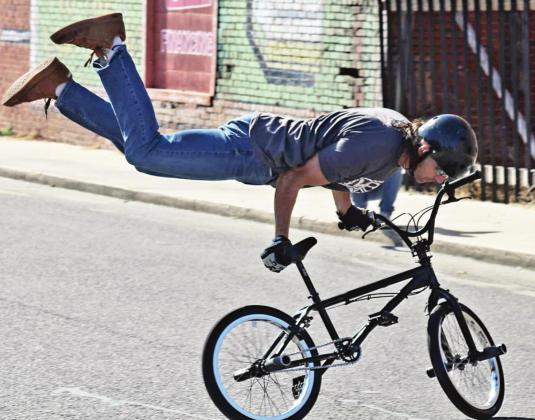 Rich Wieber performing at the 2021 Vintage in the Valley Bicycle Stunt Show.