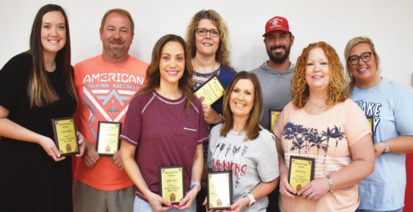 Maysville Schools recently presented Years of Service Awards to the following staff: (from left) Jordan Mejia, five years; Gordon Queener, 20 years; Ashley Sager, five years; Shelly Hildebrand-Beach, 25 years; Debbie House, 20 years; Dace Lemieux, 10 years; Julie Cayton, 25 years; and Brittany Morphew, 10 years.