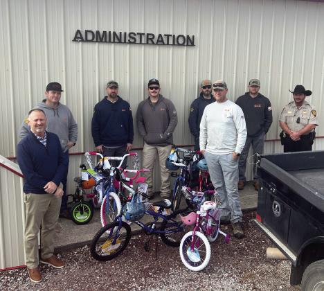 OG&E donates bicycles to Stratford toy drive