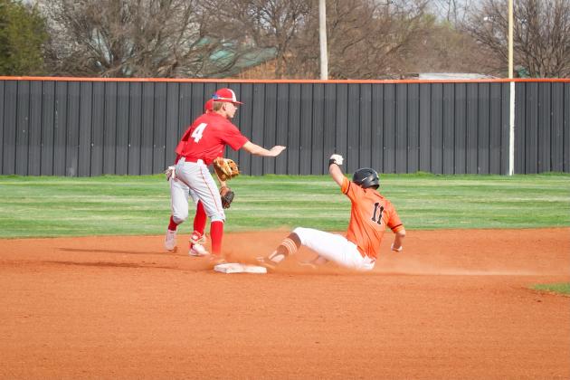 Lindsay's #11 Tucker Morris slides into second base.