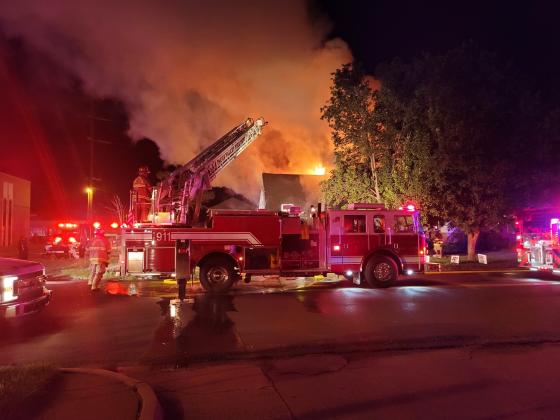 Fire crews work to extinguish a fire at 301 N. Ash in Pauls Valley Sunday night. Photo courtesy Kyle Widmer.