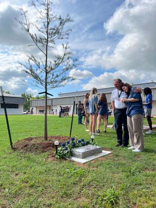 Family and friends gathered Monday at the PVHS courtyard for the dedication of a memorial in honor of Grant Marcum-Jones