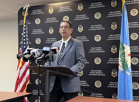 Garvin County Sheriff Jim Mullett speaks to reporters during a press conference at OSBI headquarters Friday. News Star photo by Suzanne Mackey