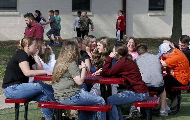 Warner middle school students spend their spare time after lunch outside chatting or playing sports. Rip Stell/Oklahoma Watch