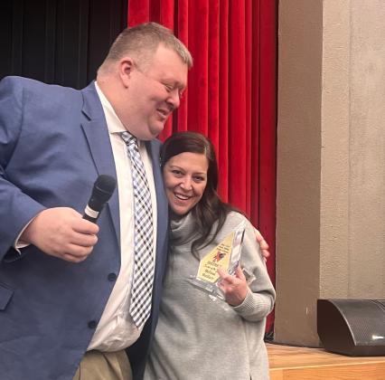 Pauls Valley Superintendent Brett Knight congratulates Pauls Valley Elementary School teacher Melissa Wallace after she was named 2024-2025 District Teacher of the Year Feb. 17. Photo courtesy of Kristi Herd.