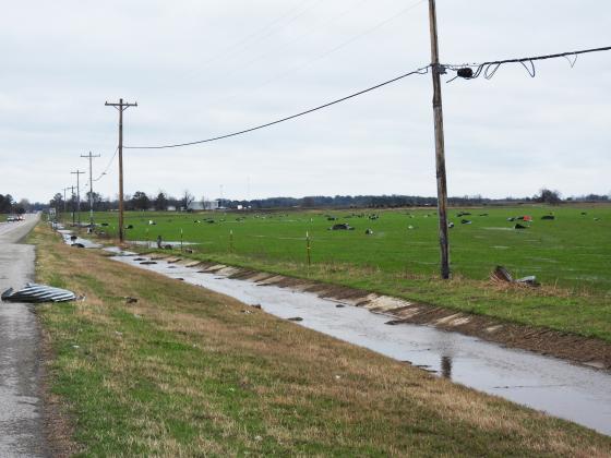 Twisted sheet metal litters a field along U.S. Highway 77 between Pauls Valley and Wynnewood after severe storms moved through the county early Saturday morning. News Star photo by Chris Mackey