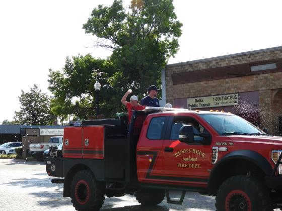 Fire trucks from multiple area departments  participated in  Monday's Water Fight Parade. News Star photo by Chris Mackey