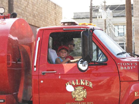 Walker Fire Department assisted in Monday's parade with water spray and balloons. News Star Photo by Chris Mackey.