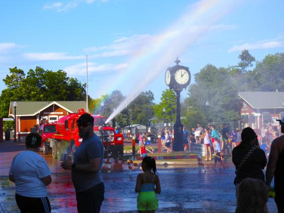 Monday's Water Fight Parade culminated with a water-soaked DJ Dance Party, free sno-cones and a few misty rainbows at the Santa Fe Depot Plaza. News Star Photo by Chris Mackey.