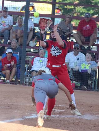 Pauls Valley's Mallory Carter dives for home plate and scores a run Monday night as the Lady Panthers played Sulphur. Photo by Mike Arie