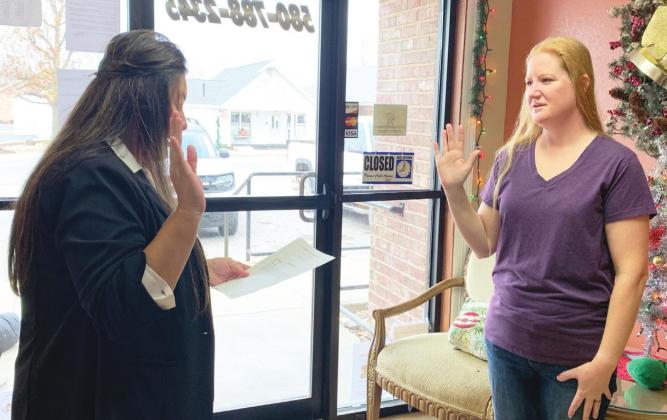 Elmore City Mayor Brandae Hucks administering oath of office to new council member Nicolette Haner