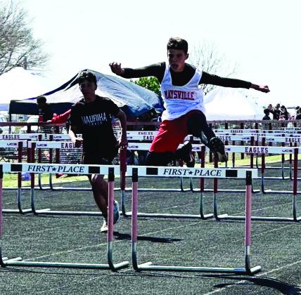 Maysville’s Josh Green runs the hurdles at Waurika on Monday. Photo courtesy of Krysti Kesler