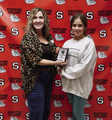 Dina Henley of Chickasaw Community Bank, a Stratford Student of the Month sponsor, presents Stratford senior Abby Mount with her October Student of the Month Award.