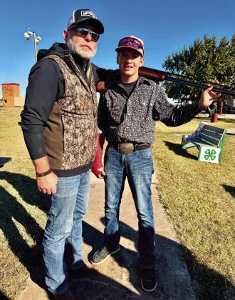 Dakota Andrews (right) and his father, Dustin.