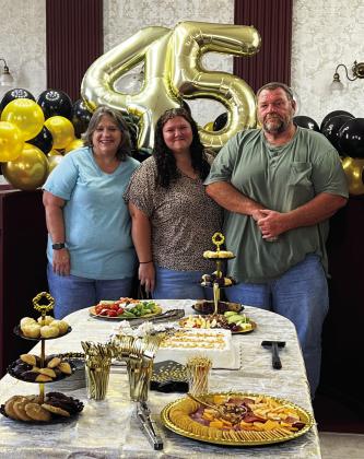 The City of Pauls Valley held a retirement reception at City Hall Tuesday for Pauls Valley Street and Sanitation Supervisor Hershel Dobbins (far right), who has been employed with the city for more than 45 years. Dobbins is pictured with his wife, Ginger, and daughter, Morgan. News Star photo by Suzanne Mackey