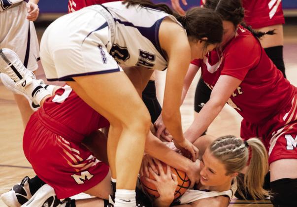 Lady Warriors win opener against Lady Badgers