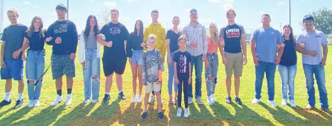 Pictured from left to Right: Senior Leopards Ely Dover and Caleb Stoll escorting Freshman candidate Tessa Inman, Junior Jacey McReynolds being escorted by Senior Leopard Sean Allgood, Senior Candidate Taryn Phillips being escorted by Senior Leopard Chad Robinson, Senior Candidate Kaylee Marcum being escorted by Senior Leopard Trace Adams, Senior Candidate Nicole Henson being escorted by Senior Leopard Dagon Harrell, and Senior Leopards Phillip Moore and Pedro Menchaca escorting Sophomore candidate Ally Beth