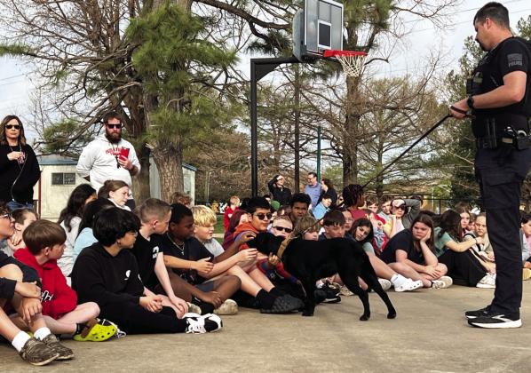 Paoli Police Chief Bradley Uhles and his K-9 partner Lyla greeted students at PVIS Wednesday morning.