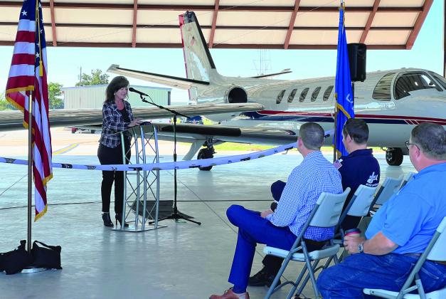 State Rep. Tammy Townley spoke to dignitaries and community members gathered at the Pauls Valley Municipal Airport Monday to celebrate the completion of a new hangar and taxiway project. News Star photo by Suzanne Mackey