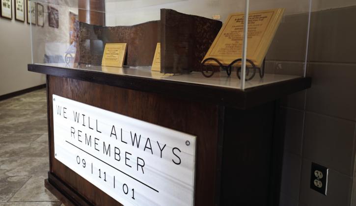 A piece of an I beam from the destroyed World Trade Center received a new glass memorial case due to the efforts of local residents and the Chickasaw Nation. The relic is on permanent display in the Johnston County Courthouse, Tishomingo, Oklahoma. The Sept. 11, 2001, attack on the World Trade Center towers, New York, killed more than 2,700 people. Courtesy photo