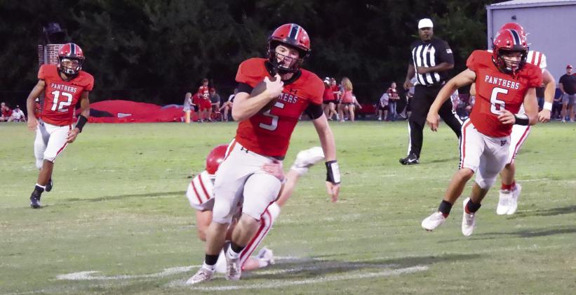 Pauls Valley’s Justin Humphrey tries to run away from a Davis Wolves defensive back during Friday’s game. The Panthers lost to Davis, 28-14. Pauls Valley will try to rebound tonight as they travel to Purcell to play against the district 2A-3 Dragons. The Panthers and Dragons have a long history of playing a good rivalry game, and this one should not be any different. Kickoff is at 7 p.m.  News Star photo by Chris Mackey