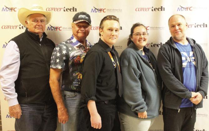 From left, Joe McGowen and Jim Webster named Derek Stewart, Elizabeth Dunn and Jacob Ginseng as the first recipients of the Oklahoma First Scholarship.