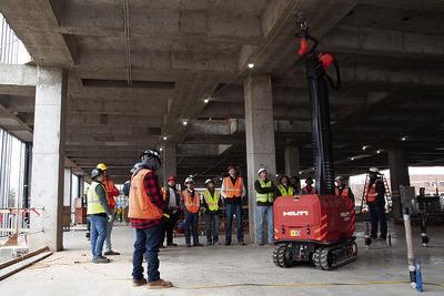 The Hilti JAIBOT robot made its Oklahoma debut at the construction site of Oklahoma State University’s New Frontiers Agricultural Hall and will be used for the next three months. A group of students from the OSU Institute of Technology in Okmulgee, Oklahoma, visited the New Frontiers site to watch the robot in action. (Photo by Mandy Gross, OSU Agricultural Communications Services)