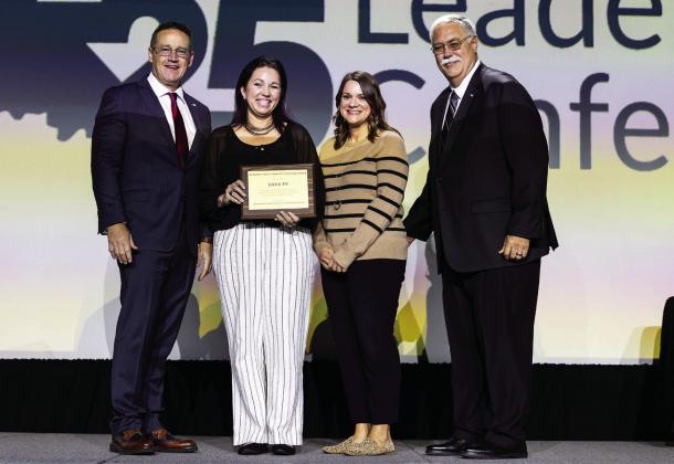 OSSBA Executive Director Shawn Hime (left) and OSSBA Immediate Past President Rick Gowin, (right) present the 2025 OSSBA Barbara Lynch Community Partner Award to Love PV representatives Jessica Herring and Alisa George. Courtesy photo