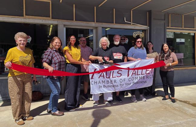 The Pauls Valley Chamber of Commerce welcomed Hello Again, a vintage market and antique store, to the downtown area with a ribbon cutting Tuesday. The shop, originally located in Sulphur and displaced by the April 2024 tornado, celebrated its reopening this week at 115 W. Paul Ave. in Pauls Valley. The shop is open Tuesday thru Saturday 10 a.m. to 5 p.m. Owners Vicki and Larry Combs plan to hold an official grand opening celebration sometime in October. News Star photo by Suzanne Mackey