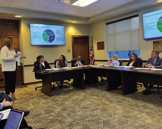 Jessica Hawkins with Healthy Minds Policy Initiative answers questions about local grant funding from the Opioid Abatement Board in Oklahoma City on Wednesday, Dec. 6, 2023. (Paul Monies/Oklahoma Watch)