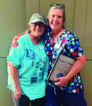 Carolyn Williams, DVM, marked her retirement as president of the Pauls Valley Animal Welfare Society’s Board of Directors last week. Williams (left) is pictured here with incoming PAWS Board President Marjie Little (left). Williams will continue to serve the organization as an advisory board member. Courtesy photo