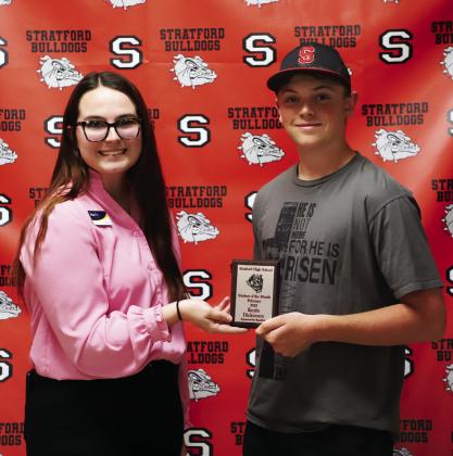 Keyln Dickerson-Kesler is the son of Rhacheal Dickerson and Jordan Mayo His award was presented by Hannah VanSchuyver of BancFirst.