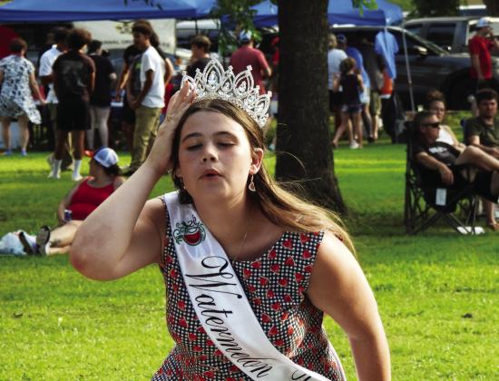 Kylee Heston, of Rush Springs, takes her turn at Pauls Valley’s Watermelon Seed Spitting Championship July 4. Heston, who also serves as the 2025 Rush Springs Watermelon Queen, placed third in the teen division of the Pauls Valley contest News Star photo by Chris Mackey