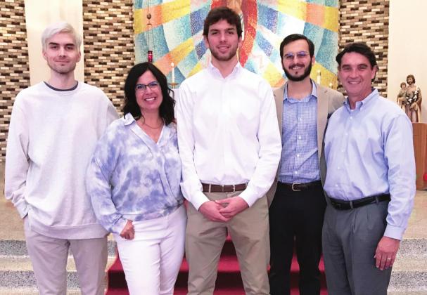 ECU President Wendell Godwin poses with his wife and three sons at St. Joseph’s Catholic Church in Ada. From left are Adam, Susie, Sam, Ben and Wendell. Courtesy Photo