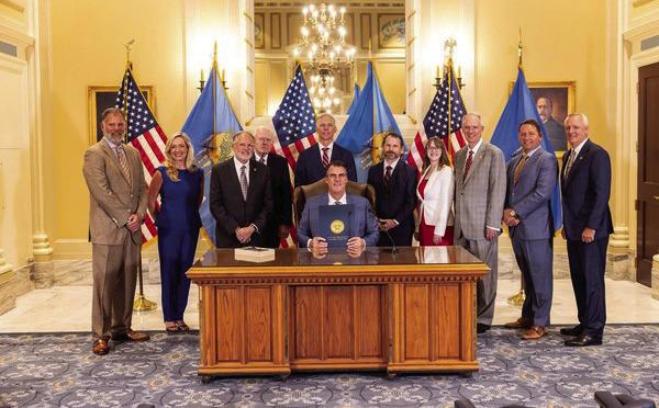Members of the Oklahoma Accountancy Board and the Oklahoma Society of CPAs join Rep. Gerrid Kendrix (right) and Gov. Kevin Stitt (center) for the ceremonial signing of HB4317. Submitted photo