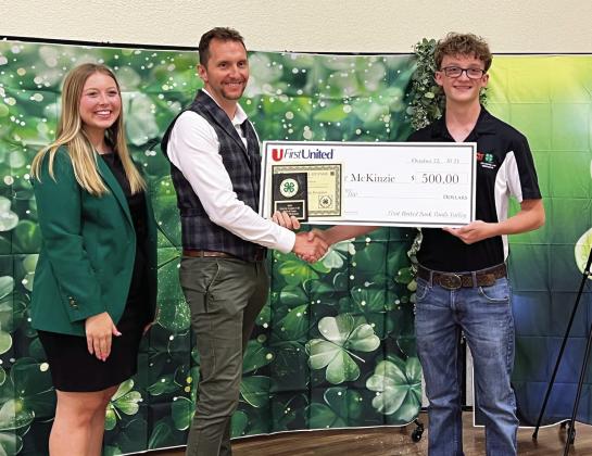 Cooper McKinzie, of Wynnewood, and Taryn McCaa, of Elmore City, were named as this year’s Senior Hall of Fame recipients during the Garvin County 4-H Achievement Banquet Oct. 12. Both received $500 scholarships from First United Bank as part of the award. Pictured (l-r) are 2023-24 Garvin County 4-H President Karlie Koesler, First United Bank Pauls Valley President JD Bostic, and McKinzie. News Star photo by Suzanne Mackey