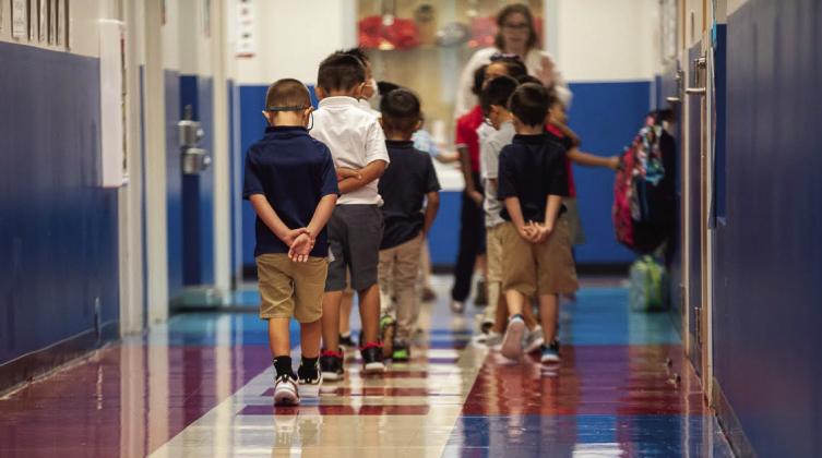 Students walked the halls of Monroe Elementary School in Oklahoma City on the morning of Aug. 11, 2022, the first day of school. (Whitney Bryen/Oklahoma Watch)
