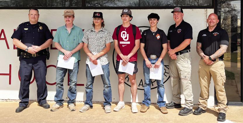 From left, Pauls Valley Police Chief Don May, Ketch Johnson, Logan Schaper, Zack Hayes, Braxton Brumley, Pauls Valley Assistant Fire Chief Marcus Hamilton and Fire Chief Scott Woods. News Star photo by Suzanne Mackey